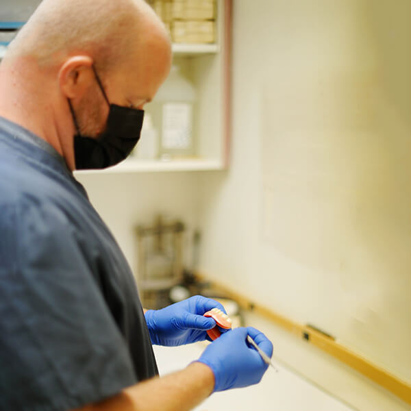 Robert Estes detailing a denture